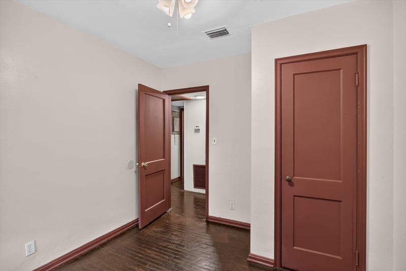 Hallway with red trim doors at 2132 Allandale Cir W, Jacksonville, FL