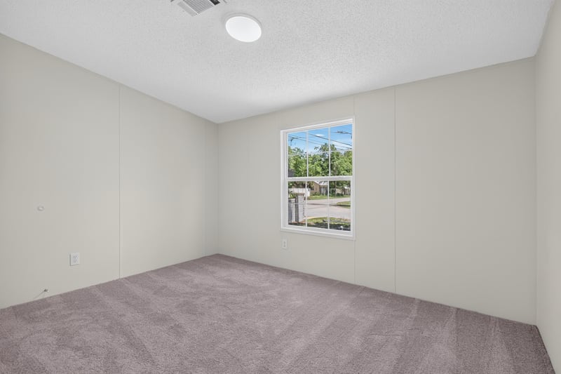 Bedroom with window, unfurnished at 7603 Coach Park Dr, Jacksonville, FL 32244