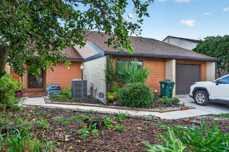 Front exterior side angle with landscaping at 3515 Cormorant Branch Ct, Jacksonville, FL