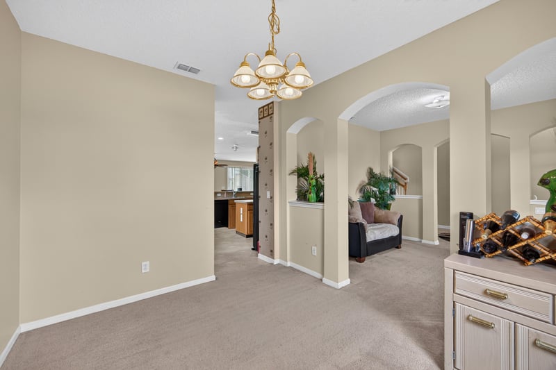 Dining area with chandelier at 2875 Pebblewood Ln, Orange Park, FL 32065