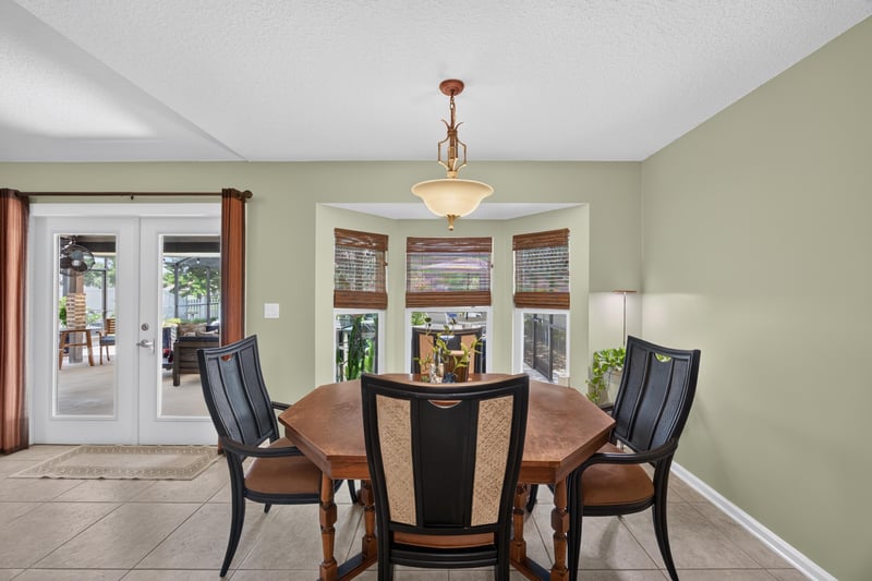Dining area with french doors at 1589 Backwater Drive, Middleburg, FL 32068