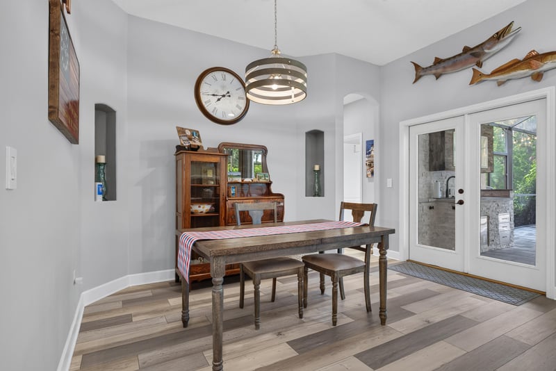 Breakfast nook with table and French doors at 2304 Spring Hill Ct, Orange Park, FL