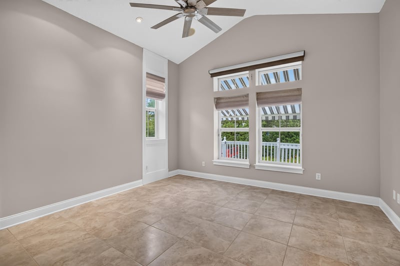 Empty room with tall windows at 117 Island Cottage Way, St. Augustine, FL 32080