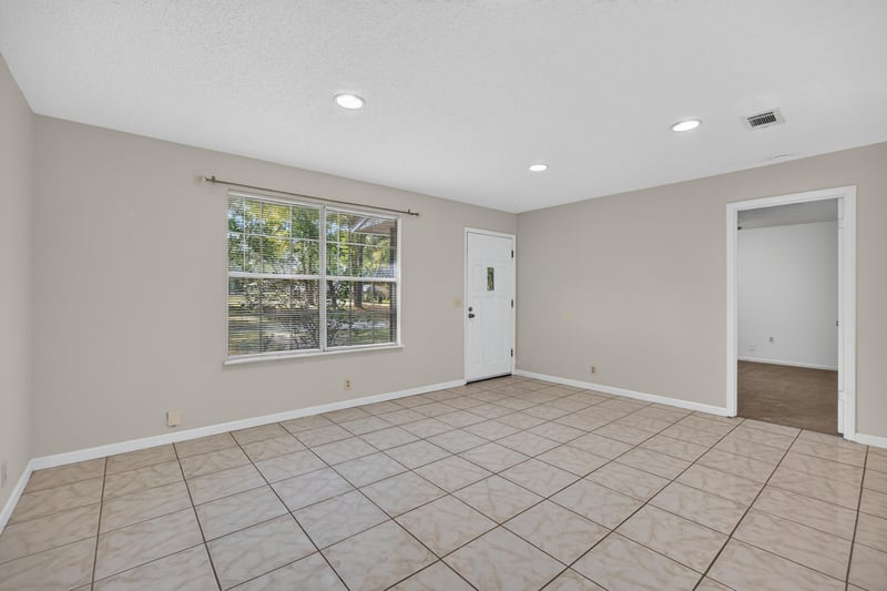 Living area view toward front door and hallway at 2829 Blackberry Ave