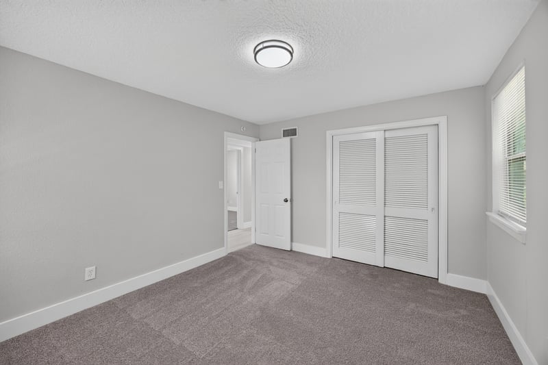 Bedroom with closet and carpet at 6238 Randia Dr, Jacksonville, FL 32210