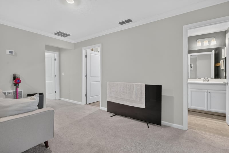 Upstairs hallway leading to bedrooms at 1186 Beach Dune Dr, Jacksonville, FL 32233