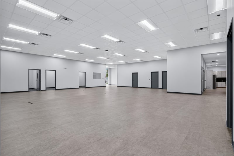 Open space with interior doors and vinyl flooring at 7240 Golden Wings Rd building 100, Jacksonville, FL 32244