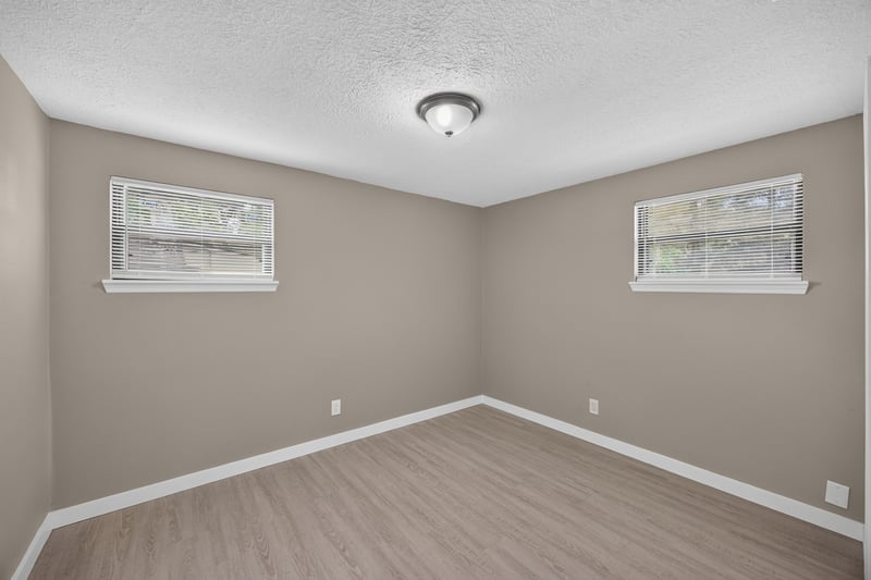 Empty bedroom with windows at 184 Draco St, Orange Park, FL 32073