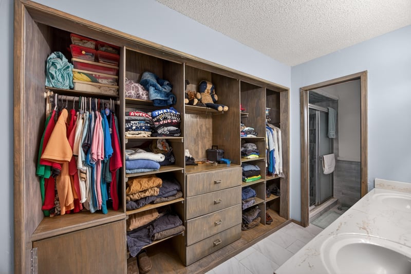 Walk-in closet with built-in shelving at 981 Marble Ridge Dr, Orange Park, FL 32065