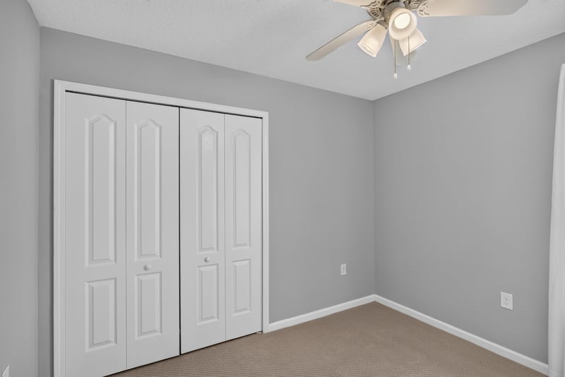 Closet with double doors and carpet at 85 Amia Dr, St. Augustine, FL 32086