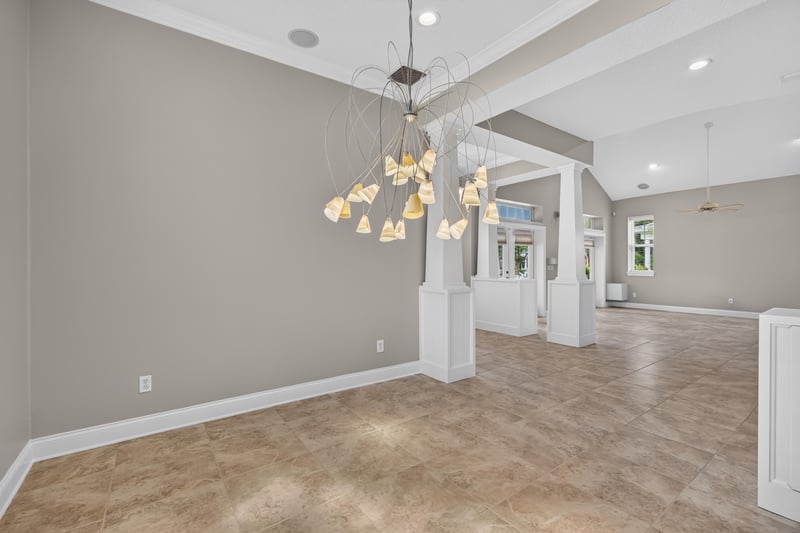 Open living space with vaulted ceiling at 117 Island Cottage Way, St. Augustine, FL 32080