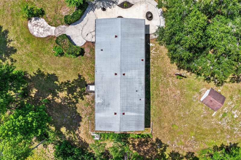 Aerial close view of the metal roof at 4890 McAllister Rd, Middleburg, FL 32068
