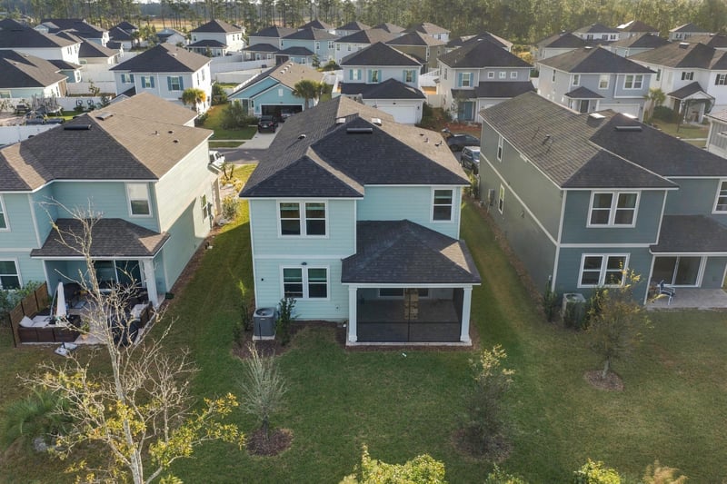 Drone view of rear exterior and porch, photographed by Megapixeler on Torres Trace, St. Augustine