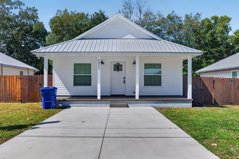 Front exterior with covered porch and driveway at 2855 N 8th St, St. Augustine, FL 32084