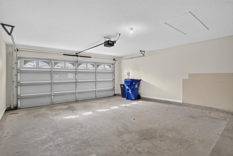 Two-car garage with garage door at 299 John's Creek Pkwy, St. Augustine, FL 32092