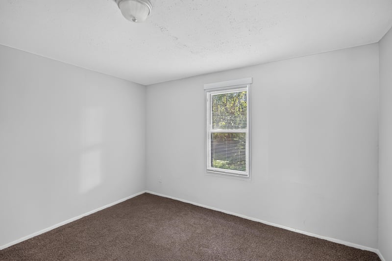 Bedroom with carpet and window at 2372 2nd Ave, Jacksonville, FL 32208