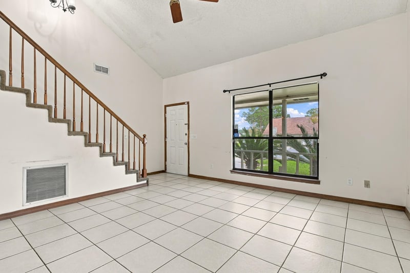Open staircase with tall window, photographed by Megapixeler on Blue Teal Ct, Jacksonville