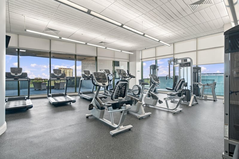 Building fitness center with skyline view, photographed by Megapixeler on Riverplace Blvd, Jacksonville