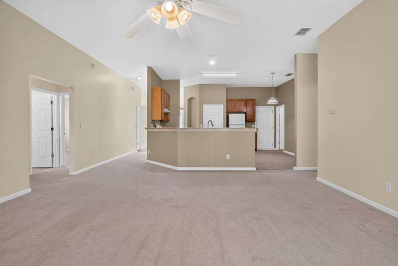 Kitchen with wood cabinets and island at 299 John's Creek Pkwy, St. Augustine, FL 32092