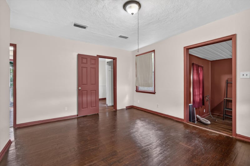 Hallway with red trim doors at 2132 Allandale Cir W, Jacksonville, FL
