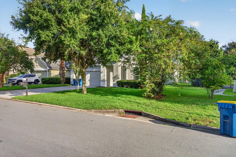 Street view toward home with driveway and mailbox at 13685 Goodson Pl, Jacksonville, FL 32226