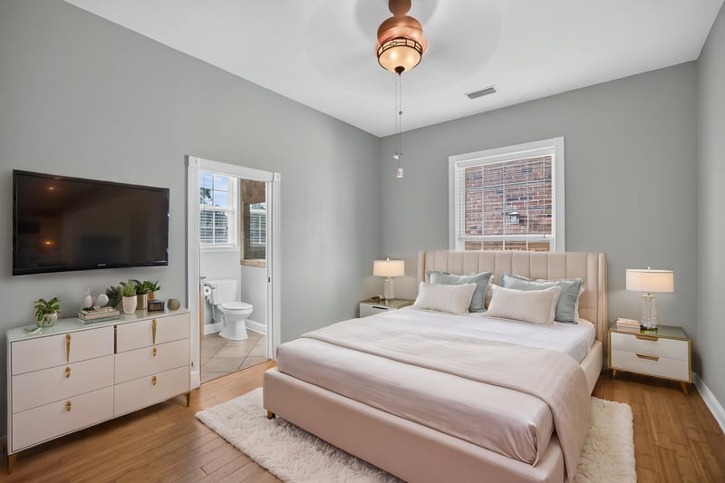 Bedroom staged with television and dresser at 1735 Hagans Ridge Ct