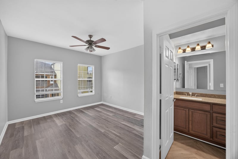 Empty bedroom with view toward the hallway and bath at 10075 Gate Pkwy unit 1905, Jacksonville, FL 32246