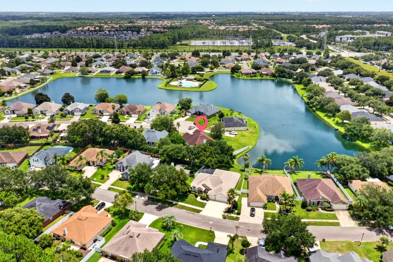 Aerial view of lakefront homes and winding streets in Windsor Chase