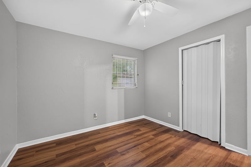 Empty bedroom with closet door at 4030 Leonard Cir W, Jacksonville, FL 32209