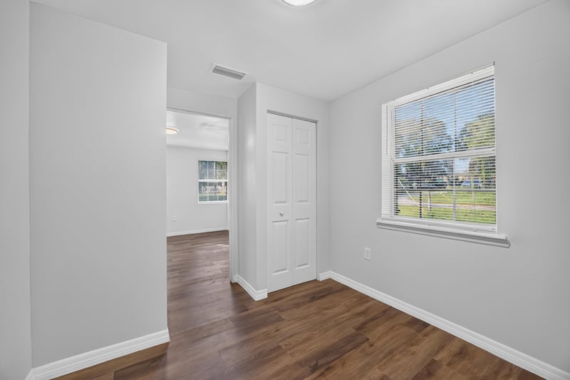 Room with window and hallway closet at 4951 Halls Dr