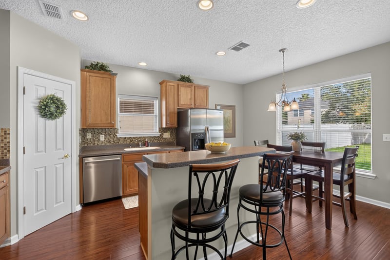Kitchen island with bar seating at 3660 Middlebrook Dr, Orange Park, FL 32065