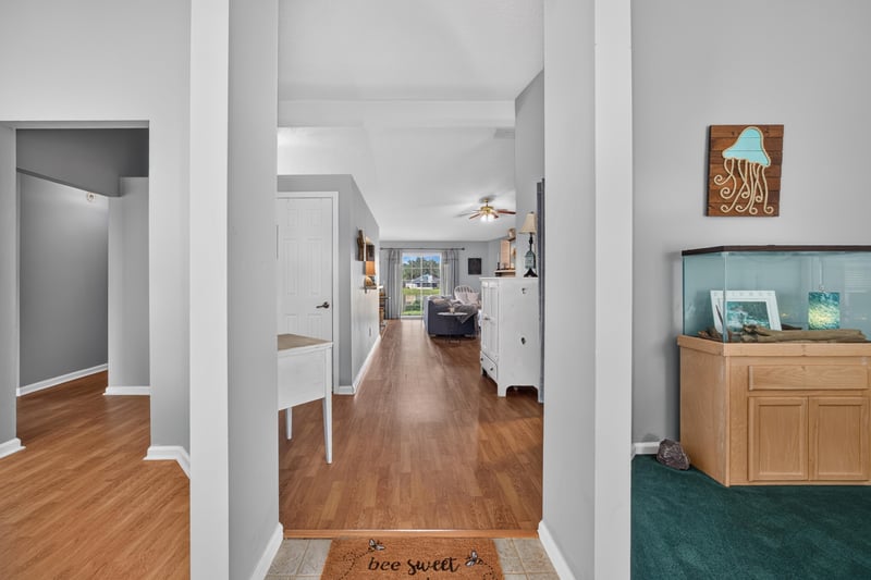 Entry hallway with wood flooring at 4556 Shaky Leaf Ln N, Jacksonville, FL 32224