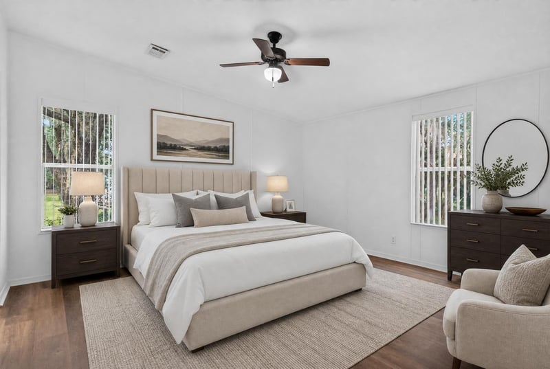 Bedroom with virtually staged bed and nightstands at 3215 Robin Ln, Middleburg, FL