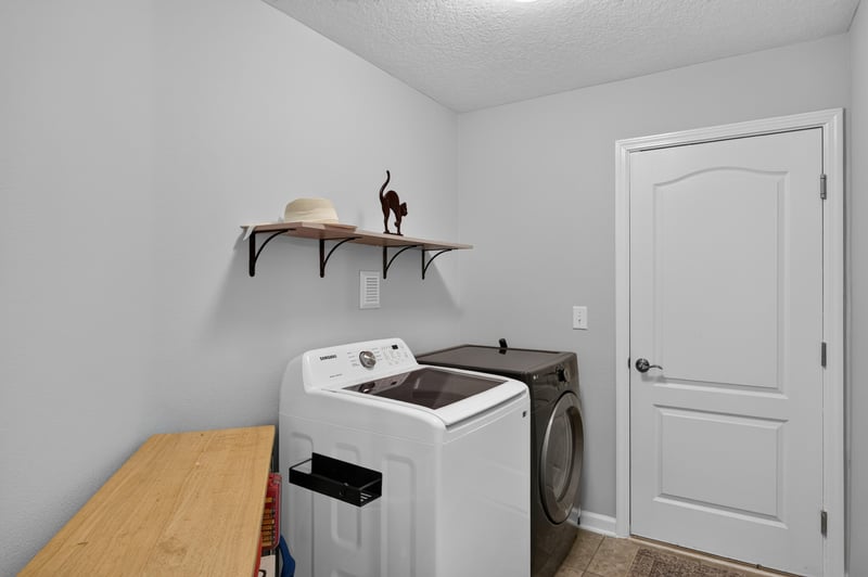 Laundry room with washer and dryer at 85 Amia Dr, St. Augustine, FL 32086