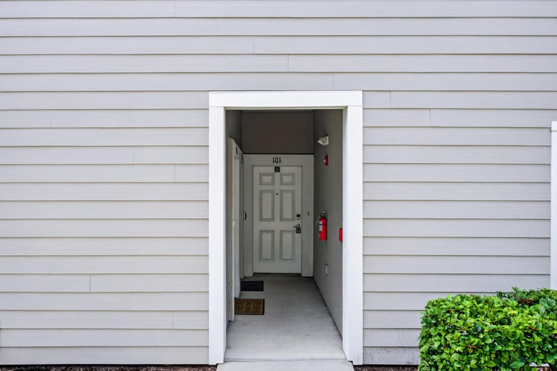 Front entry door with view into the foyer at 8196 Cabin Lake Cir, Jacksonville, FL 32256