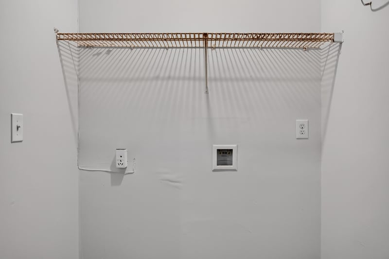 Laundry closet with hookups at 8047 Mactavish Way E, Jacksonville, FL 32244