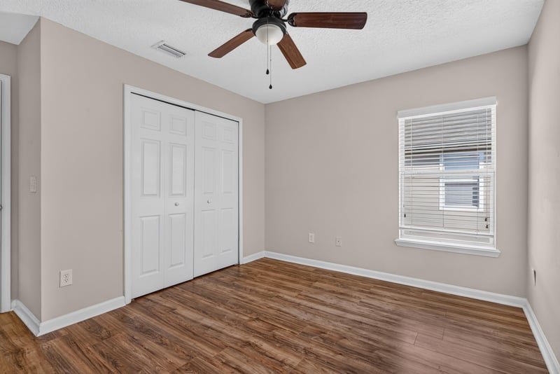 Bedroom with closet and natural light at 7047 Deer Lodge Cir, Jacksonville
