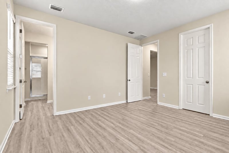 Hallway with multiple interior doors at 7088 Mahogany Run Dr, Jacksonville, FL 32244