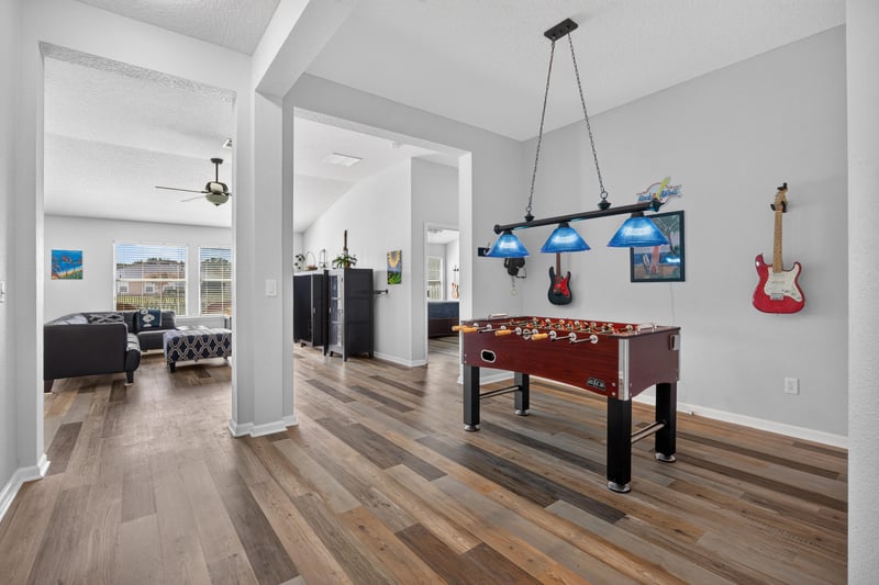 Game room with foosball table and pendant lighting at 2065 Creekmont Dr