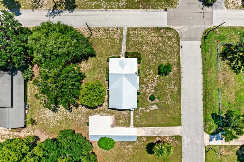 Drone straight-down view of house and lot at 101 N Lake St, Crescent City, FL