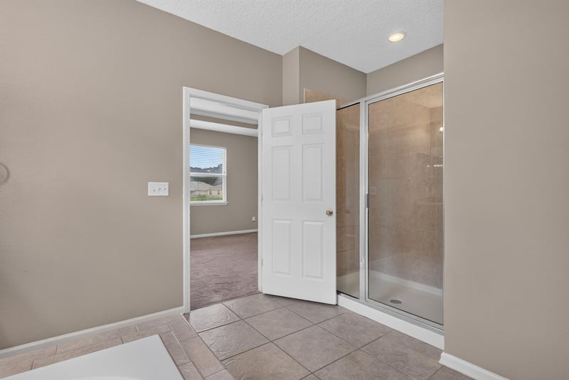 Bedroom with closet doors open at 13685 Goodson Pl, Jacksonville, FL 32226