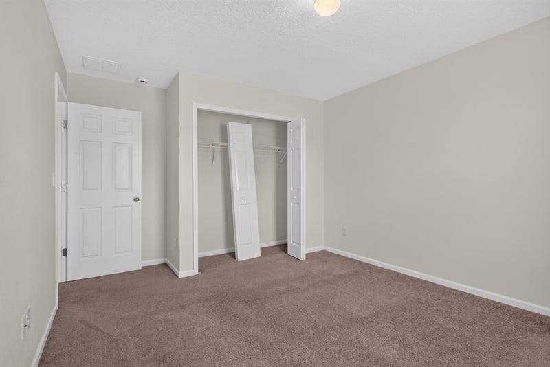Hallway with closet doors at 263 Gilmore Ln, Orange Park, FL 32065