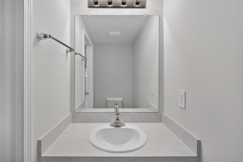 Half bathroom with single vanity at 4024 Bay Hawk Ct, Jacksonville, FL