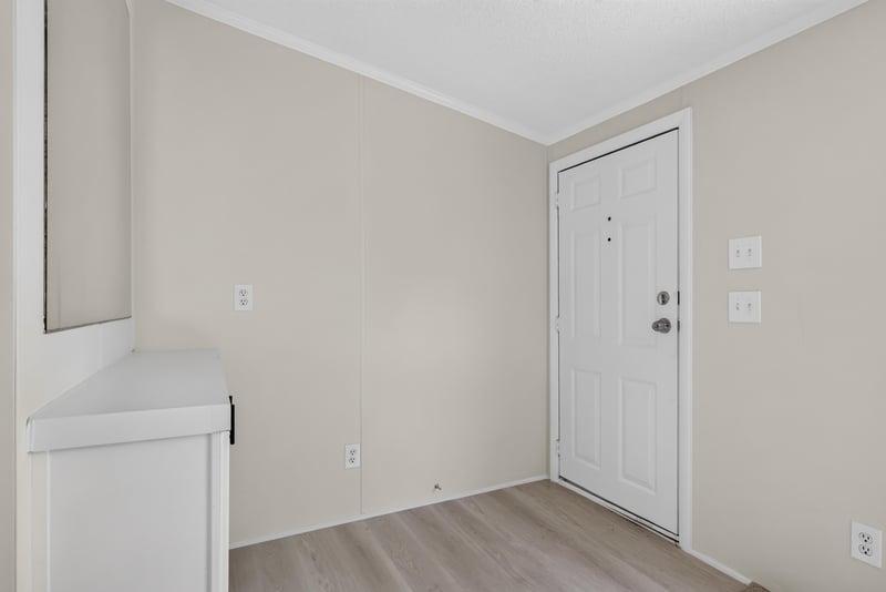 Interior hallway with closet and door at 7603 Coach Park Dr, Jacksonville, FL 32244