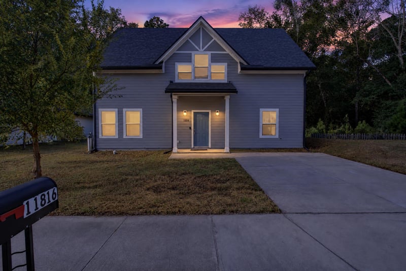 Front exterior at day-to-dusk, photographed by Megapixeler on Lem Turner Rd, Jacksonville