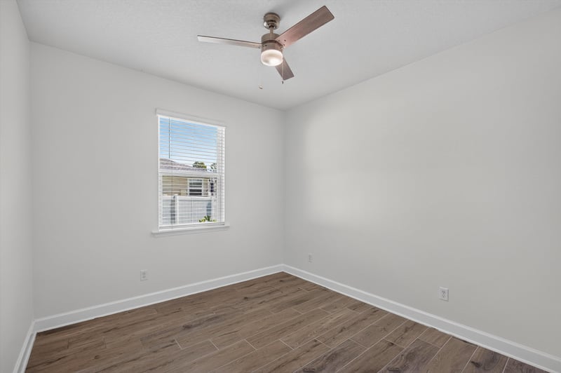 Bedroom with window at 855 Flach Dr, St. Johns, FL