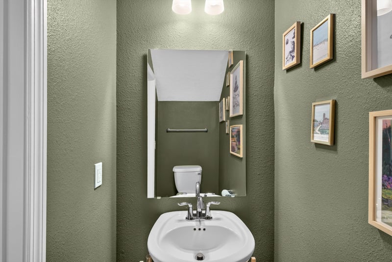 Powder room with framed art at 1186 Beach Dune Dr, Jacksonville, FL 32233