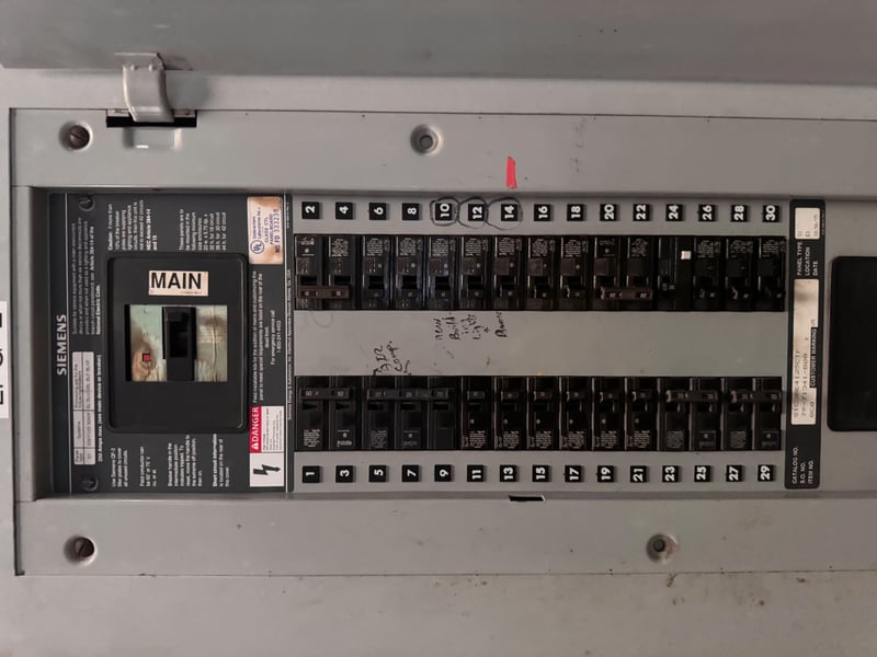 Main breaker panel with labeled switches at 11700 New Kings Rd, Jacksonville, FL 32219