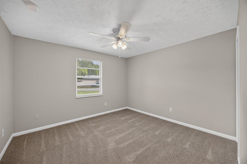 Bedroom with window and carpet at 1143 Tumbleweed Dr, Orange Park, FL 32065