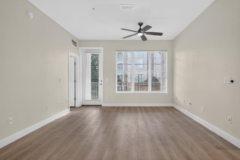 Living room with natural light and ceiling fan at 11251 Campfield Dr unit 1202, Jacksonville, FL 32256